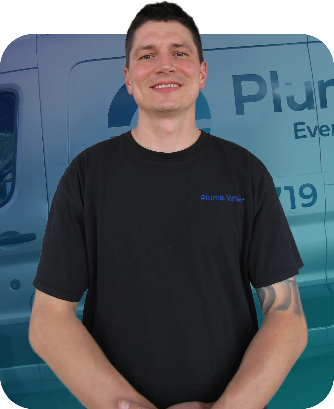 Levi in front of PlumbWiser Van